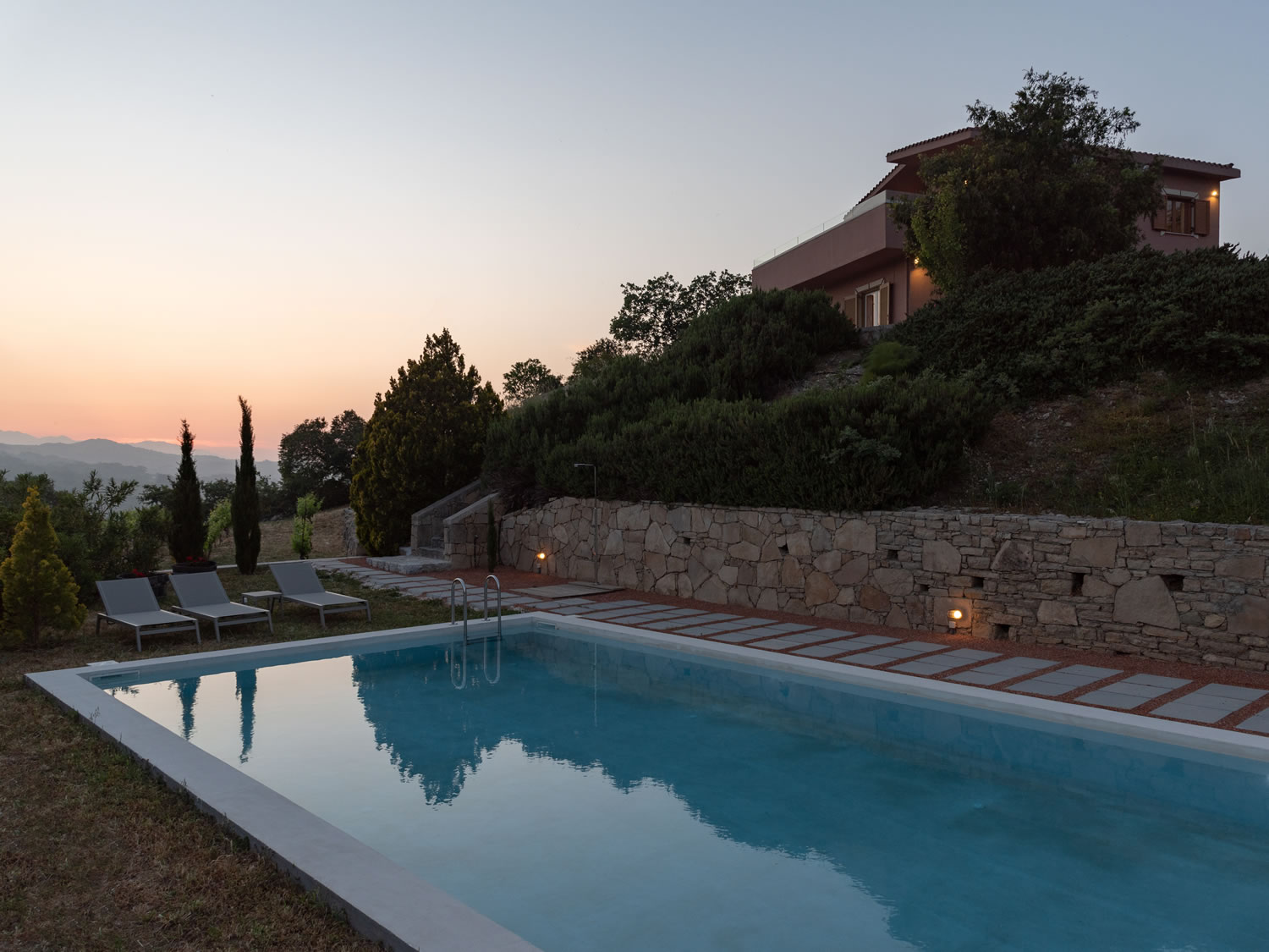 Outdoor Pool Area at Eleonas Estate's Luxury Villa in Crete, Greece
